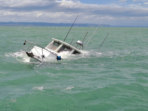 Image of boat sinking new