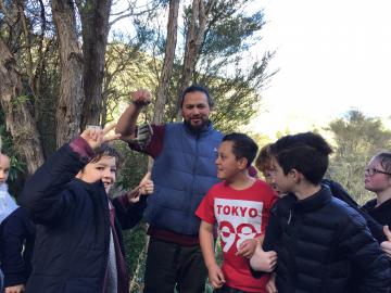 Onekawa students pleased to see Pereri King retrieve a dead rat from a trap